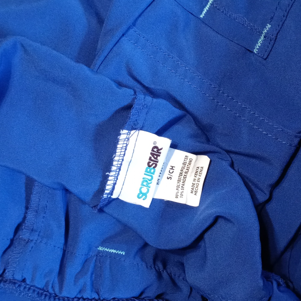 Pre-owned 2 pr.Scrubstar pants SzS. In good condition,2 shades of blue